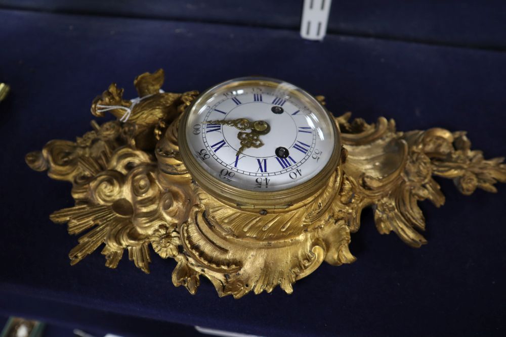 A Louis XV ormolu cartel clock case with later movement